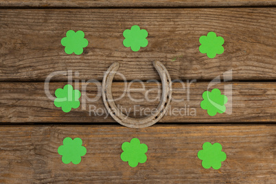 St Patricks Day shamrocks surrounded with horseshoe