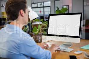 Graphic designer working on computer