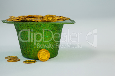 St. Patricks Day leprechaun hat filled with chocolate gold coins