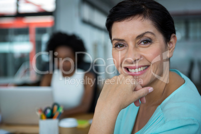 Female graphic designer smiling