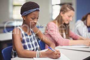 Students studying in classroom