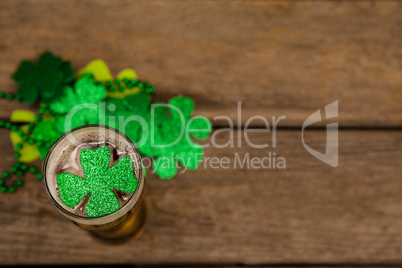 Glass of beer and shamrock for St Patricks Day