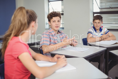 Students studying in classroom