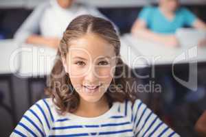 Portrait of smiling schoolgirl