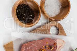 Sirloin chop, salt and black pepper