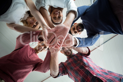 Team of businesspeople forming hand stack