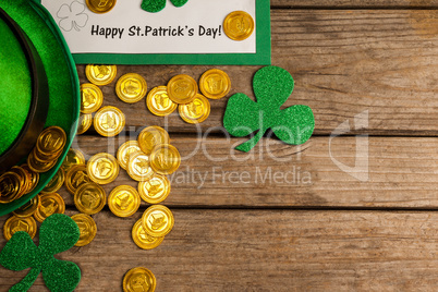 St Patricks Day placard, leprechaun hat with shamrock and gold chocolate coin