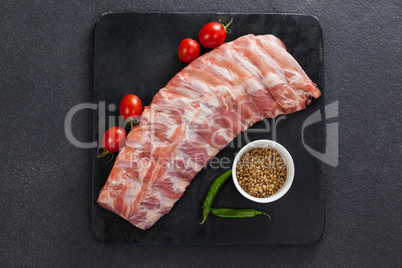 Beef ribs, cherry tomatoes and coriander seeds