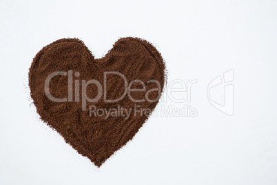 Coffee powder forming heart shape