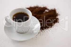 Black coffee with cinnamon powder
