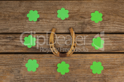 St Patricks Day shamrocks surrounded with horseshoe