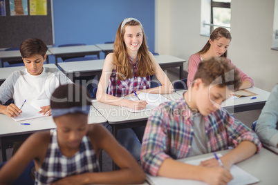 Students studying in classroom