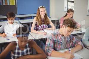 Students studying in classroom