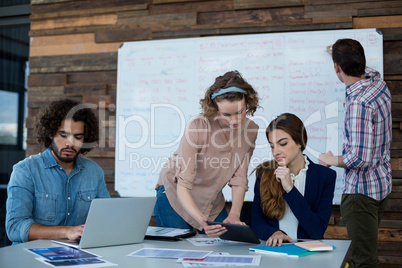 Business executives working in office