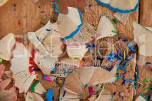 Shavings of various colored pencil