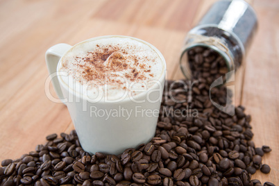 Coffee with coffee beans and jar