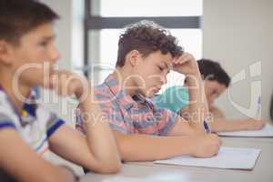 Students studying in classroom