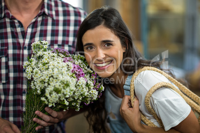 Couple with a bouquet of flowers