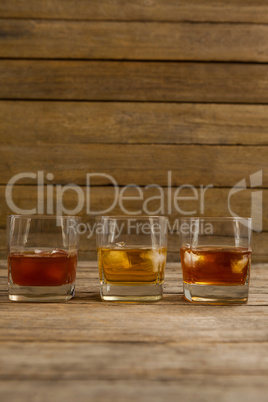 Three glasses of whiskey