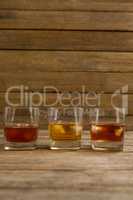 Three glasses of whiskey