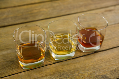 Three glasses of whiskey