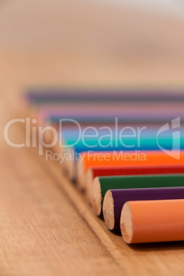 Close-up of colored pencil in a row