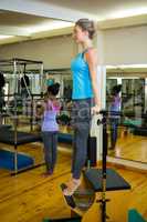 Woman exercising on wunda chair