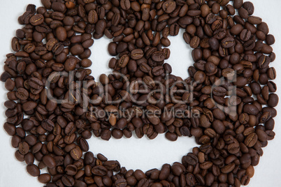 Coffee beans forming smiley face