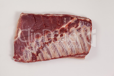 Beef brisket against white background