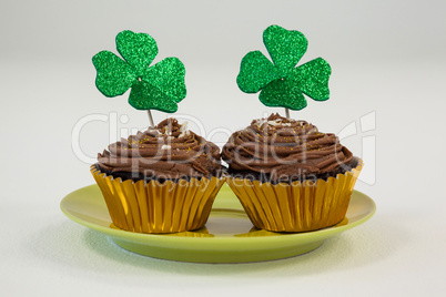 St Patricks Day shamrock on the cupcake kept in plate