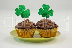 St Patricks Day shamrock on the cupcake kept in plate