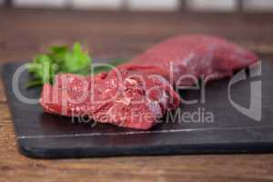 Beef steak on black slate plate