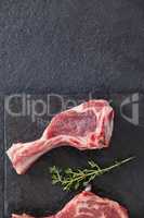 Rib chop and herb on black slate plate