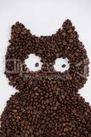 Coffee beans forming owl