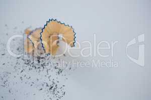 Blue color pencil shavings on a white background