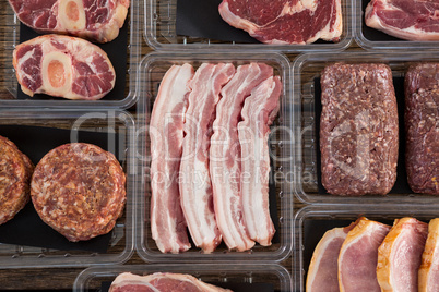 Varieties of meat in plastic boxes