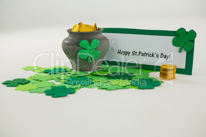 St. Patricks Day shamrocks and pot filled with chocolate gold coins