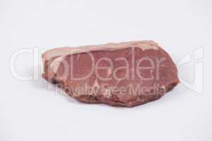 Sirloin chop against white background