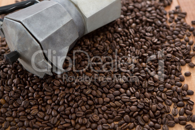 Coffee beans with metallic coffeemaker