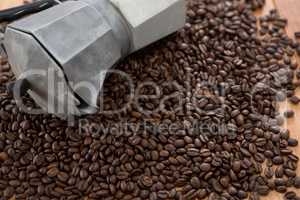 Coffee beans with metallic coffeemaker