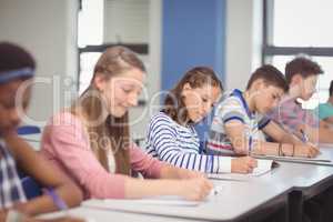 Students studying in classroom