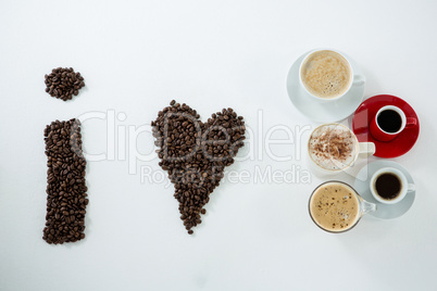 Coffee beans forming shape I love coffee