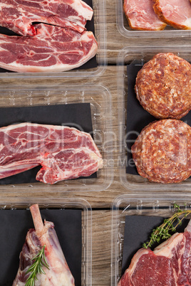 Varieties of meat in plastic boxes