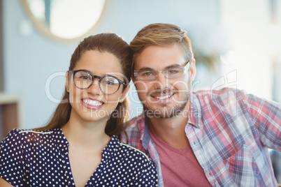 Portrait of smiling couple wearing spectacles