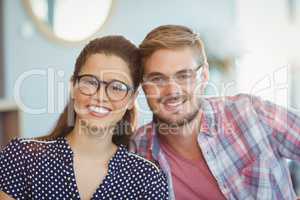 Portrait of smiling couple wearing spectacles