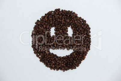 Coffee beans forming smiley face