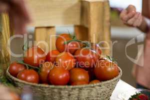 Basket of fresh tomatoes on the counter