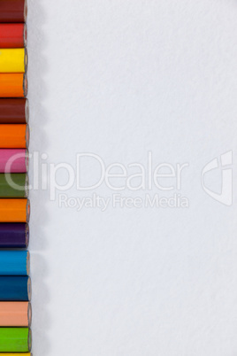 Close-up of colored pencil in a row