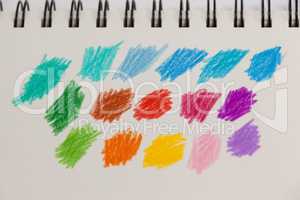 Hand drawn colorful stripes on note book
