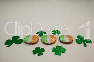 St. Patricks Day cookies decorated with irish flag surrounded with shamrocks